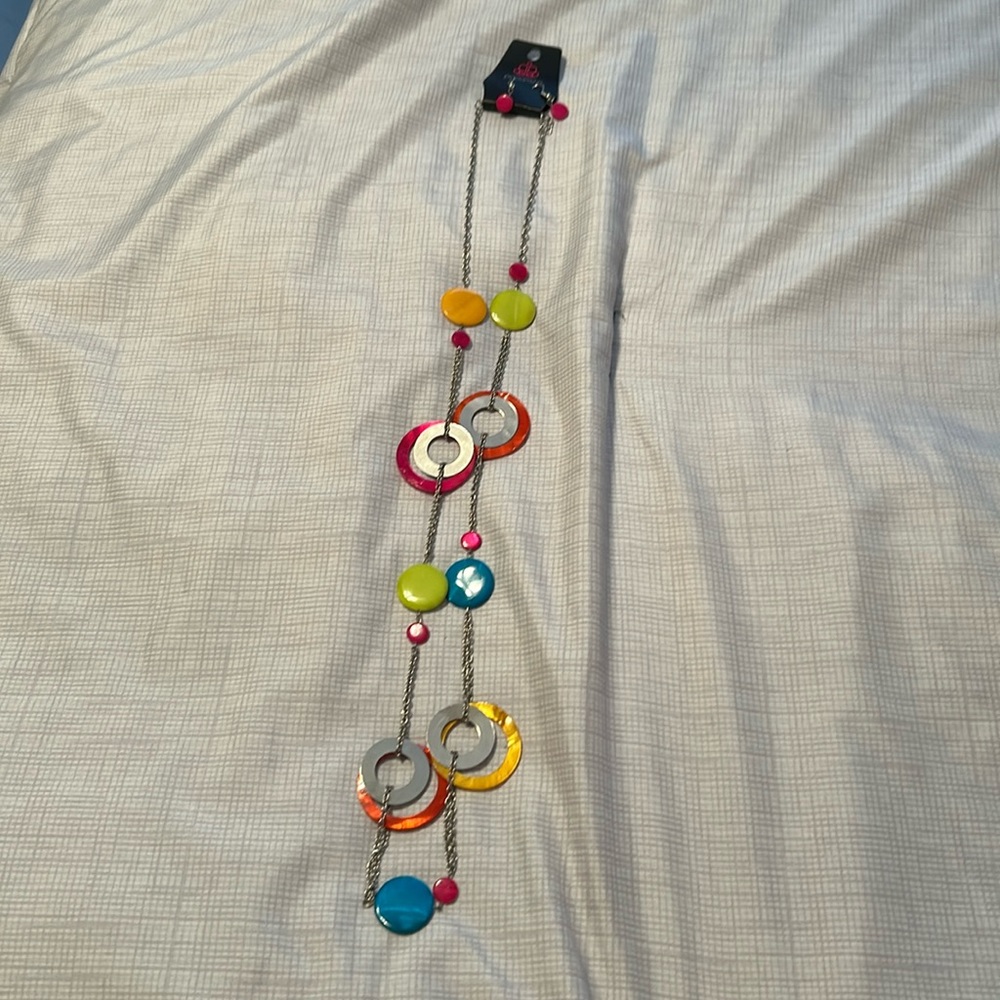 Bright colorful necklace with matching pink earrings. Perfect for summer.